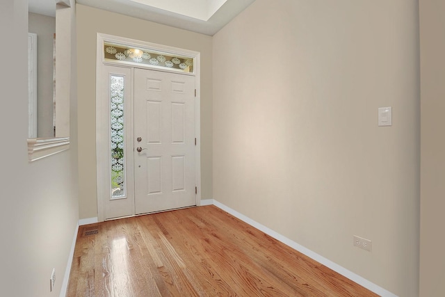1250 Ashbury Pl Unit 1250, Lemont, IL 60439 - foyer with baseboards and light wood-type flooring