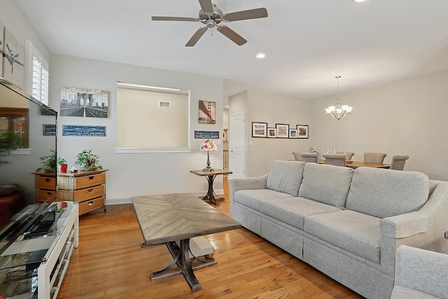 1250 Ashbury Pl Unit 1250, Lemont, IL 60439 - living room with ceiling fan, recessed lighting, a chandelier, and light wood-style flooring