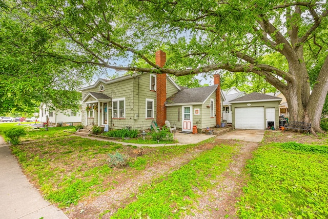 24038 W Oak St, Plainfield, IL 60544 - view of front facade featuring driveway and a chimney