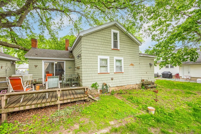 24038 W Oak St, Plainfield, IL 60544 - back of house featuring a wooden deck, a chimney, a yard, and outdoor dining area