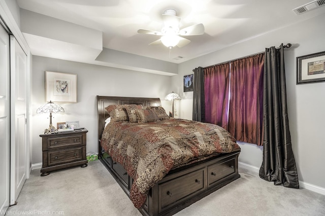 4876 N Hermitage Ave Unit 104, Chicago, IL 60640 - bedroom featuring light colored carpet, baseboards, a ceiling fan, and a closet