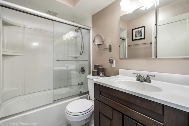 4876 N Hermitage Ave Unit 104, Chicago, IL 60640 - full bath featuring vanity, toilet, and combined bath / shower with glass door