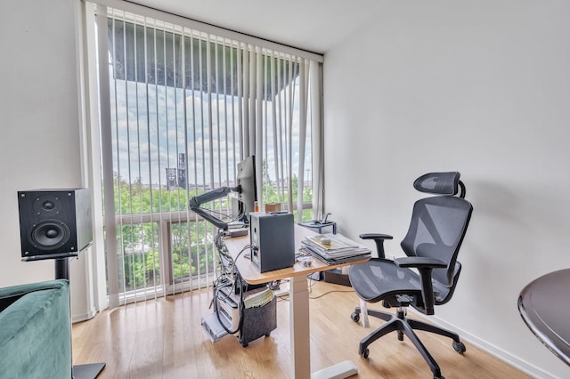 61 W 15th St Unit 407, Chicago, IL 60605 - office area featuring healthy amount of natural light, wood finished floors, and baseboards