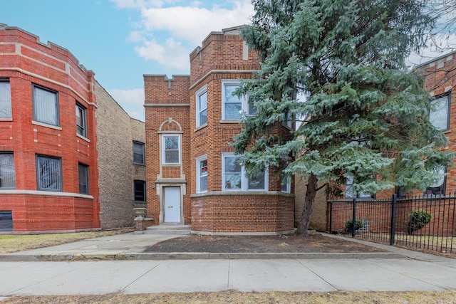 7353 S Martin Luther King Dr, Chicago, IL 60619 - view of front of property featuring brick siding and entry steps