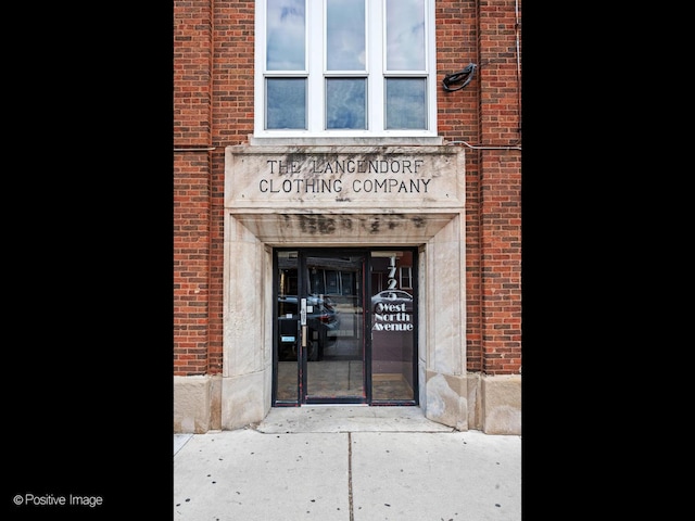 1725 W N Ave Unit 204, Chicago, IL 60622 - view of exterior entry featuring brick siding