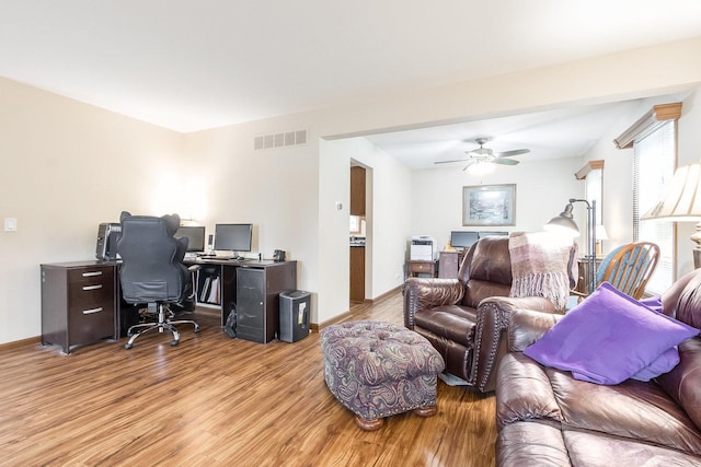 2975 Partridge Ct, Aurora, IL 60502 - living room featuring a desk, wood finished floors, baseboards, and ceiling fan