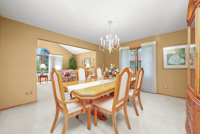 22314 Jeanette Ct, Frankfort, IL 60423 - dining space featuring a chandelier, light carpet, and baseboards