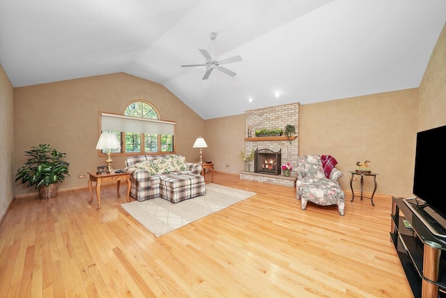 22314 Jeanette Ct, Frankfort, IL 60423 - living area with wood finished floors, a ceiling fan, lofted ceiling, and a fireplace