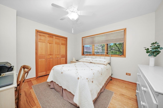 22314 Jeanette Ct, Frankfort, IL 60423 - bedroom with a closet, light wood-type flooring, a ceiling fan, and baseboards