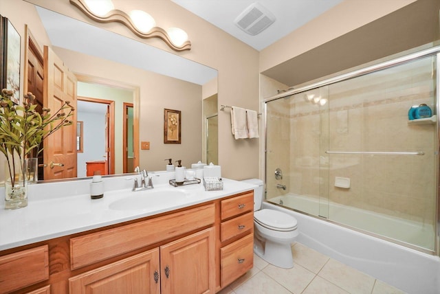 22314 Jeanette Ct, Frankfort, IL 60423 - full bath featuring toilet, tile patterned flooring, vanity, and shower / bath combination with glass door
