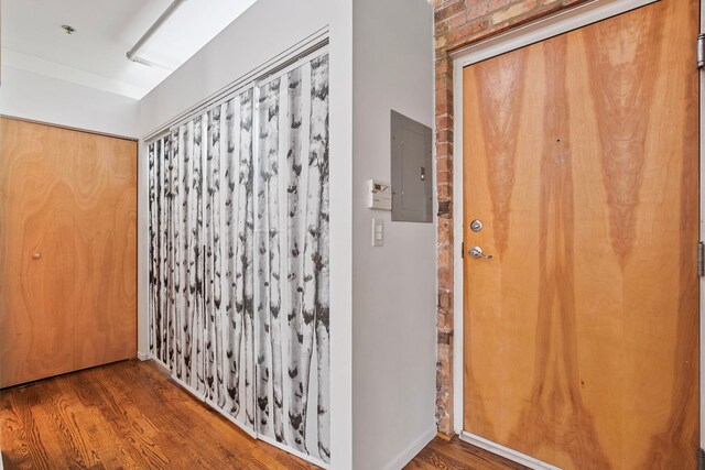 420 S Clinton St Unit 102A, Chicago, IL 60607 - hall with electric panel and wood finished floors