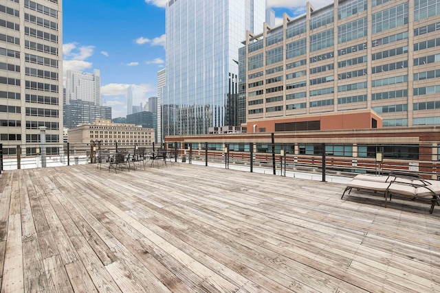 420 S Clinton St Unit 102A, Chicago, IL 60607 - wooden terrace featuring a skyline view