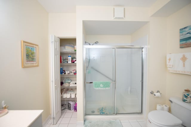 8400 Callie Ave Unit 206, Morton Grove, IL 60053 - full bathroom featuring a stall shower, toilet, tile patterned floors, and vanity