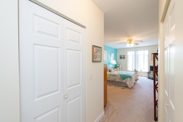 8400 Callie Ave Unit 206, Morton Grove, IL 60053 - bedroom featuring light colored carpet, baseboards, and ceiling fan