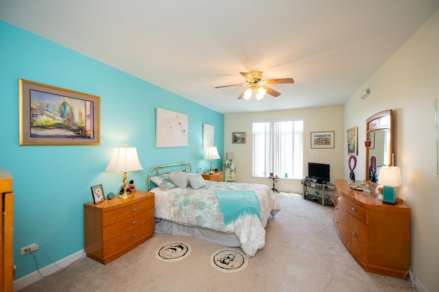 8400 Callie Ave Unit 206, Morton Grove, IL 60053 - bedroom featuring light carpet, ceiling fan, and baseboards
