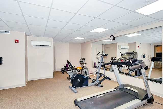 8400 Callie Ave Unit 206, Morton Grove, IL 60053 - gym featuring a wall mounted AC, a drop ceiling, carpet, and baseboards