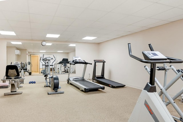 8400 Callie Ave Unit 206, Morton Grove, IL 60053 - exercise room featuring carpet flooring, a wall unit AC, and a paneled ceiling