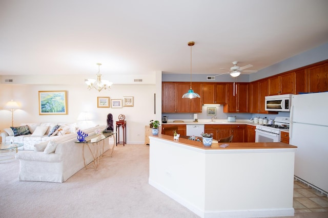 8400 Callie Ave Unit 206, Morton Grove, IL 60053 - kitchen featuring white appliances, a chandelier, a ceiling fan, and hanging light fixtures