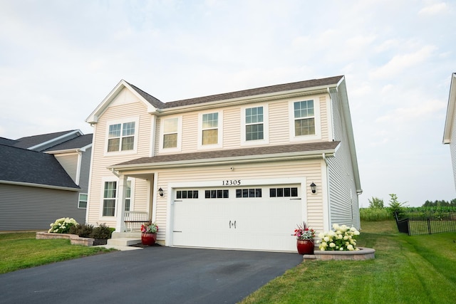 12305 S Prairie Ridge Ln, Plainfield, IL 60585 - traditional-style home featuring asphalt driveway and a garage