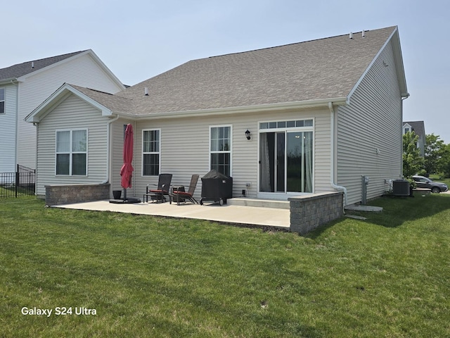 12305 S Prairie Ridge Ln, Plainfield, IL 60585 - rear view of property featuring a patio and roof with shingles