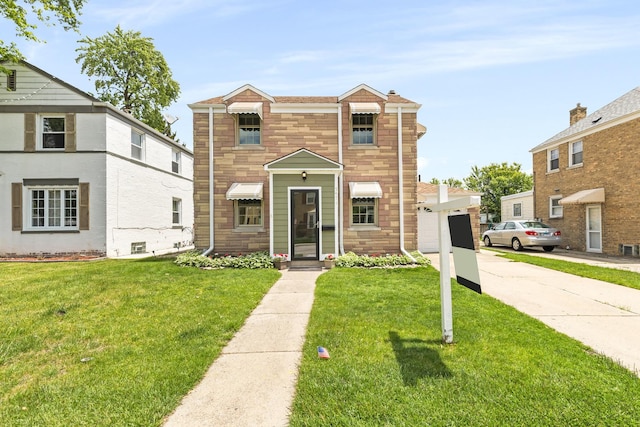 5471 N Octavia Ave, Chicago, IL 60656 - view of front of house with stone siding and a front lawn