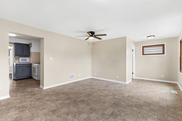 5471 N Octavia Ave, Chicago, IL 60656 - unfurnished room with ceiling fan and baseboards