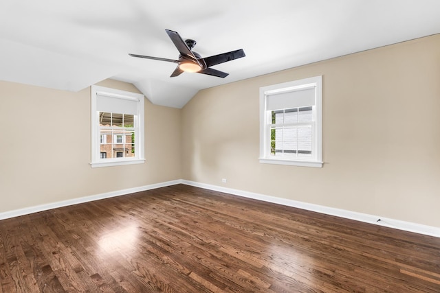 5471 N Octavia Ave, Chicago, IL 60656 - empty room with dark wood-style floors, baseboards, lofted ceiling, and a ceiling fan