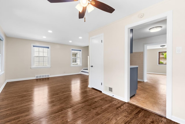 5471 N Octavia Ave, Chicago, IL 60656 - unfurnished room with healthy amount of natural light, wood finished floors, ceiling fan, stairway, and recessed lighting