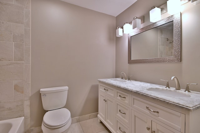 7624 Chestnut Dr, Orland Park, IL 60462 - full bath with double vanity, toilet, baseboards, and tile patterned flooring