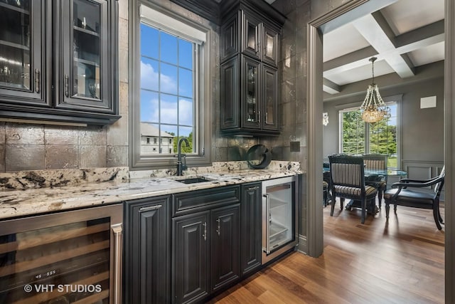 14 Vandenbergh Dr, South Barrington, IL 60010 - kitchen with wine cooler, coffered ceiling, backsplash, dark wood-type flooring, and beam ceiling