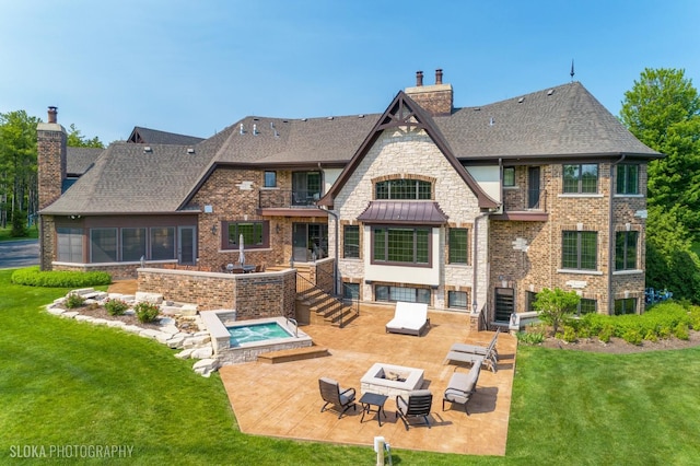 14 Vandenbergh Dr, South Barrington, IL 60010 - rear view of property featuring a chimney, a patio area, a lawn, a shingled roof, and an outdoor kitchen