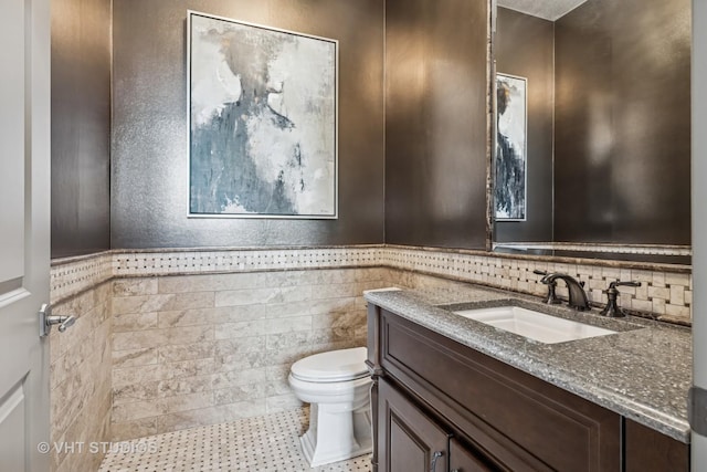 14 Vandenbergh Dr, South Barrington, IL 60010 - bathroom featuring vanity, tile walls, tile patterned floors, and a wainscoted wall