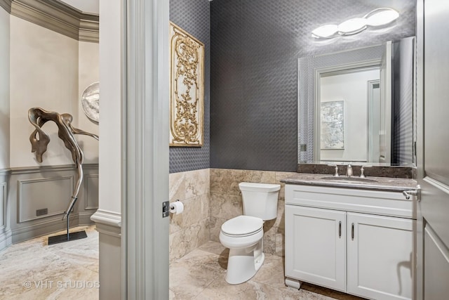 14 Vandenbergh Dr, South Barrington, IL 60010 - bathroom with wainscoting, vanity, and wallpapered walls