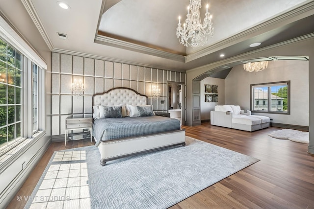 14 Vandenbergh Dr, South Barrington, IL 60010 - bedroom with a chandelier, arched walkways, multiple windows, crown molding, and wood finished floors