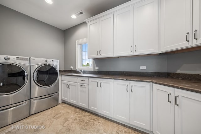 14 Vandenbergh Dr, South Barrington, IL 60010 - washroom featuring cabinet space, washer and dryer, recessed lighting, and light stone finish flooring