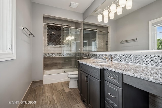 14 Vandenbergh Dr, South Barrington, IL 60010 - full bathroom with vanity, enclosed tub / shower combo, and backsplash