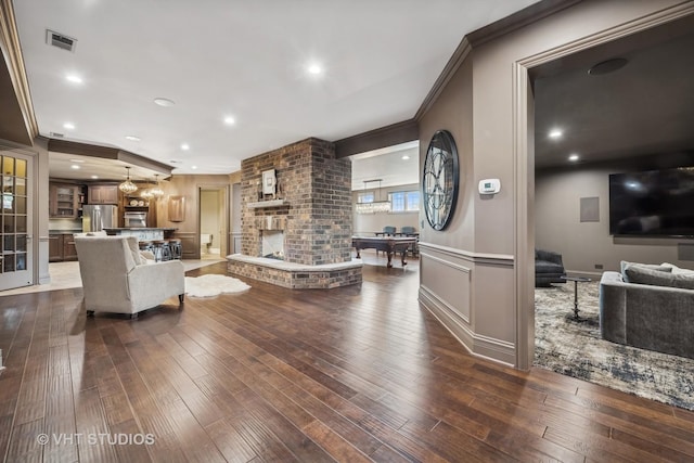 14 Vandenbergh Dr, South Barrington, IL 60010 - living room with ornamental molding, dark wood-type flooring, and recessed lighting