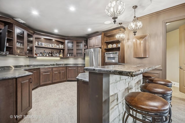 14 Vandenbergh Dr, South Barrington, IL 60010 - bar area with appliances with stainless steel finishes, hanging light fixtures, crown molding, recessed lighting, and a chandelier