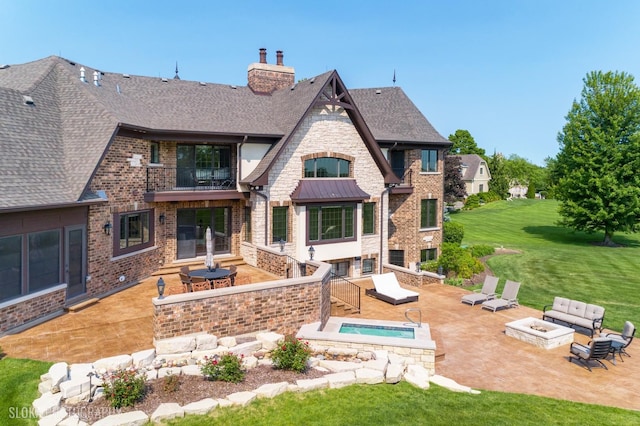 14 Vandenbergh Dr, South Barrington, IL 60010 - rear view of house featuring a balcony, a patio, a shingled roof, and an in-ground hot tub