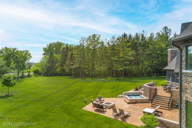 14 Vandenbergh Dr, South Barrington, IL 60010 - view of green lawn with an outdoor fire pit and a patio area