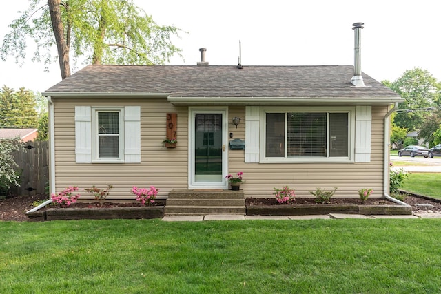 307 Highland Rd, Grayslake, IL 60030 - bungalow-style house featuring entry steps and roof with shingles