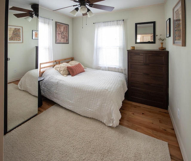 307 Highland Rd, Grayslake, IL 60030 - bedroom with wood finished floors and ceiling fan