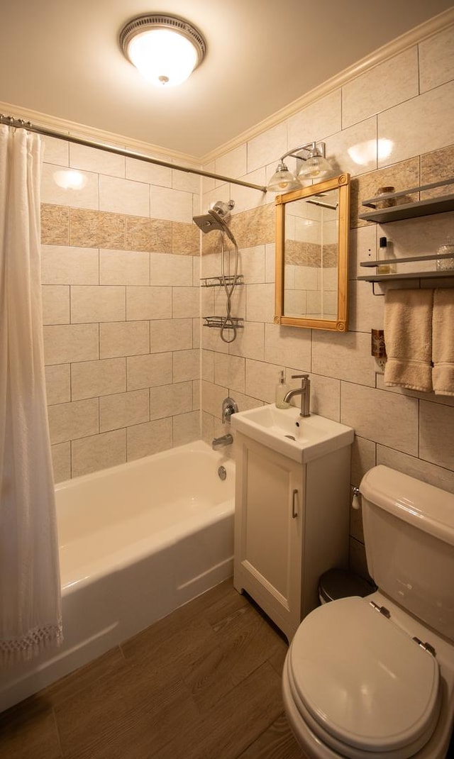 307 Highland Rd, Grayslake, IL 60030 - full bath featuring shower / bath combo, vanity, tile walls, wood finished floors, and ornamental molding