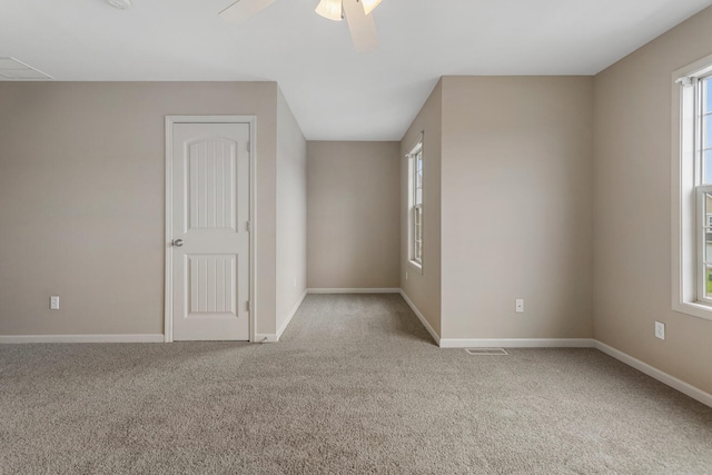3418 Stoneway Ct, Champaign, IL 61822 - carpeted spare room with baseboards and a ceiling fan