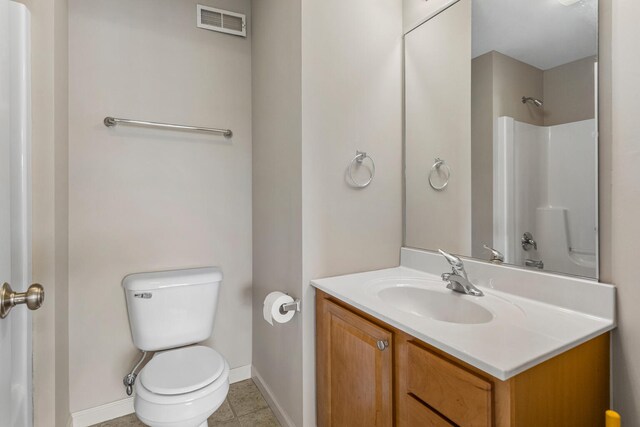 3418 Stoneway Ct, Champaign, IL 61822 - full bathroom featuring toilet, baseboards, vanity, tile patterned floors, and a shower