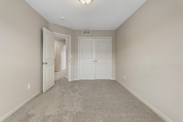 3418 Stoneway Ct, Champaign, IL 61822 - unfurnished bedroom featuring carpet flooring, baseboards, and a closet