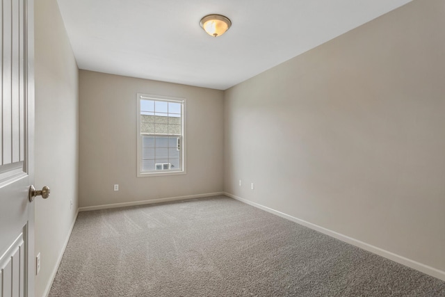 3418 Stoneway Ct, Champaign, IL 61822 - carpeted spare room with baseboards