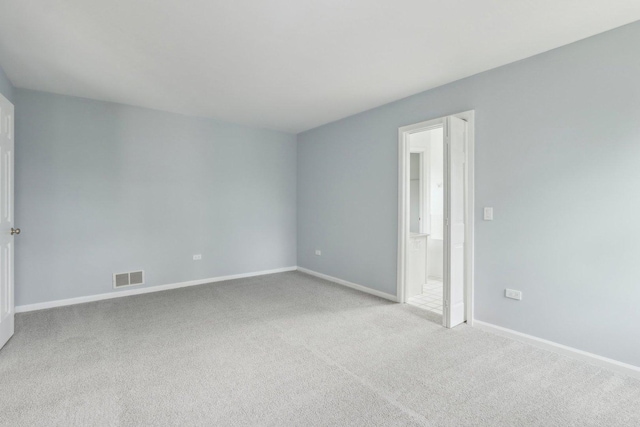 1173 Lamb Ln, Gurnee, IL 60031 - spare room with carpet and baseboards