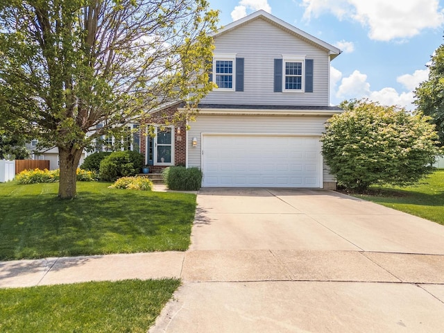 5 Tatiana Ct, Bloomington, IL 61704 - traditional-style home with an attached garage, driveway, and brick siding