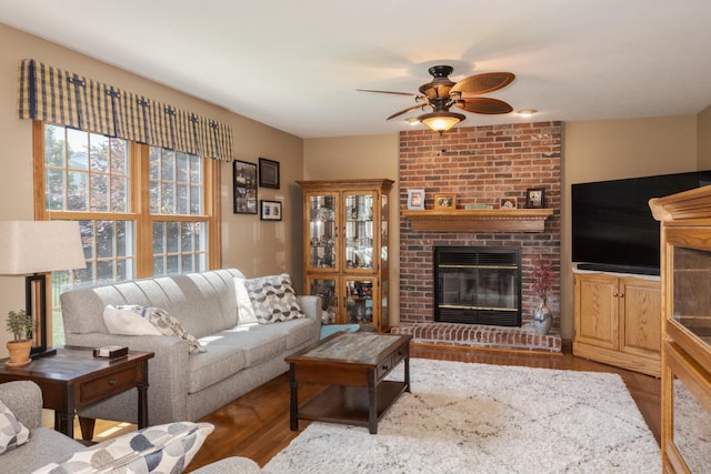 5 Tatiana Ct, Bloomington, IL 61704 - living room with ceiling fan, wood finished floors, and a fireplace